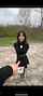 public brunette black dress