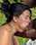 brunette european in field cuckold sign