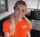 blonde glasses orangeshirt