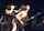 2women dark hair concert
