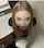 blonde submissive kneeling