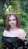 girl with red hair garden public