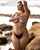 brunette beach covering tits
