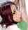 green shirt red head piercing