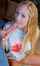 oral sex blonde looking at camera