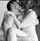 kissing couple holding