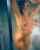 nude shower tits against glass