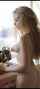 nude blonde sewing machine