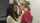 lesbian kissing office