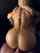 camgirl pigtail braid spine tattoo