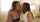 lesbian bed kissing