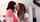 lesbian kissing standing