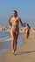 beach running brunette
