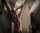 blonde chained to wall back