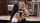 lesbian kissing kitchen