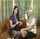 women couch talking