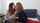 lesbians kissing couch