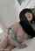 on the bed tattooing black hair