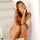 nude sitting smiling