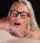 blonde glasses tongue piercing