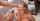 interracial topless handjob